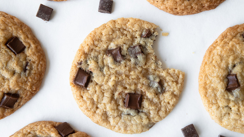 Top down view of bitten coconut chocolate chip cookie