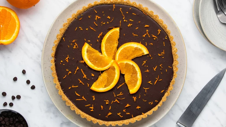 Chocolate Orange Tart on beige plate