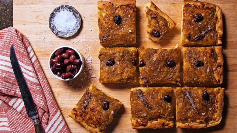 Pissaladiére (Provencal Onion Tart) on wooden board