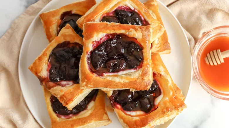Sweet and Spicy Cherry Tarts with Hot Honey on white plate
