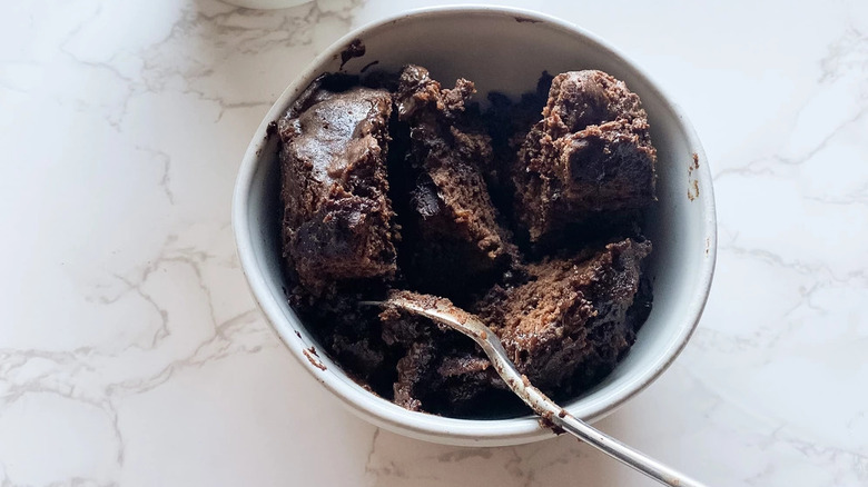 Mug Brownie in white bowl with spoon