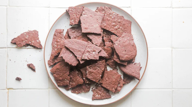 Sea Salt Brownie Brittle arranged on white plate