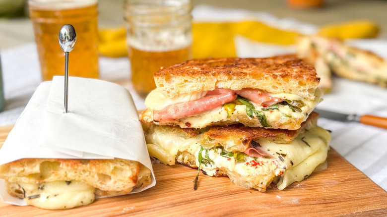 Italian picnic sandwiches on wooden board