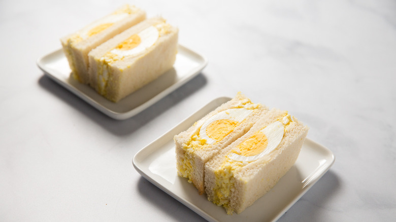 Japanese egg salad sandos on plates