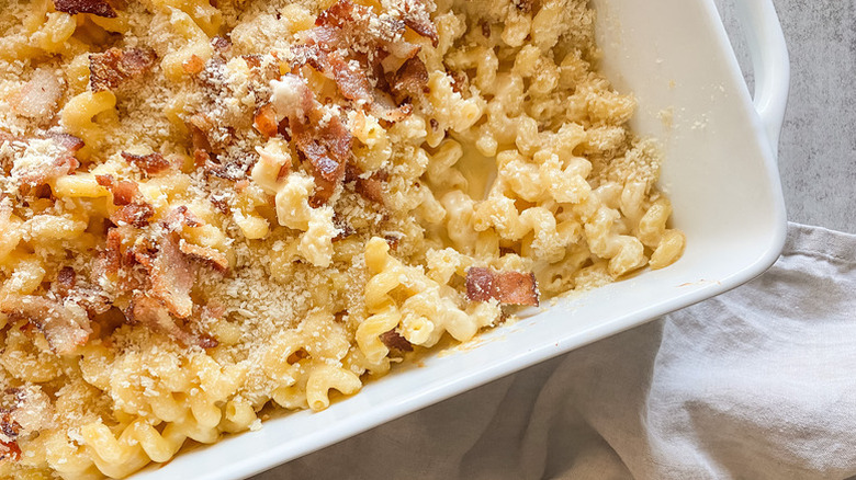 Mac and cheese with bacon in white baking dish