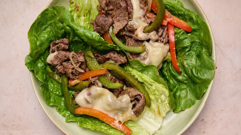 Philly Cheesesteak Lettuce Wraps on green plate