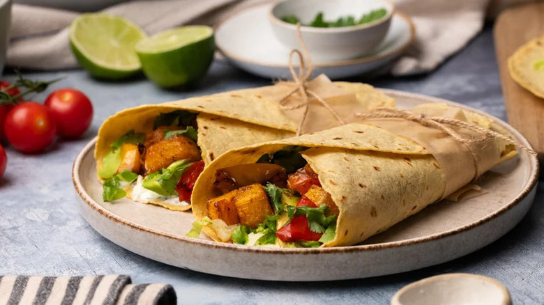 Roasted Squash and Peppers Wrap on beige plate