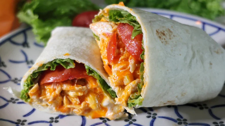 Shredded Buffalo Chicken Wrap on white and blue plate