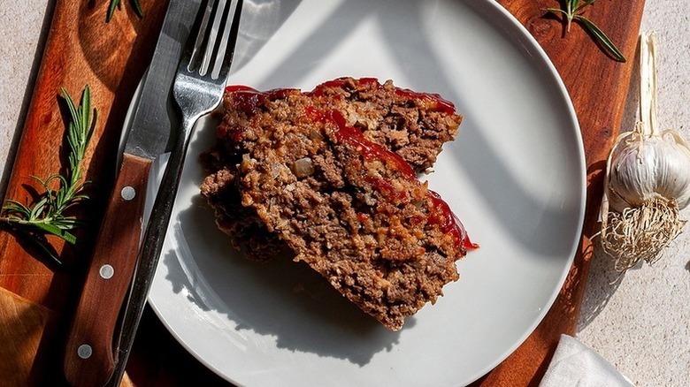 Two sliced on meat loaf on plate