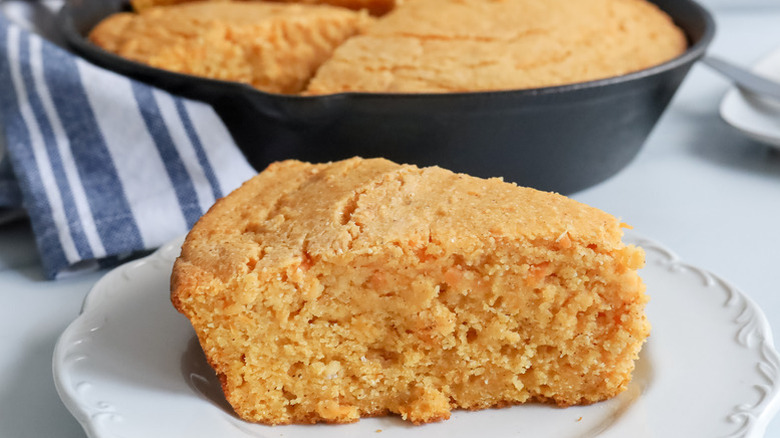 Slice of honey sweet potato cornbread on plate