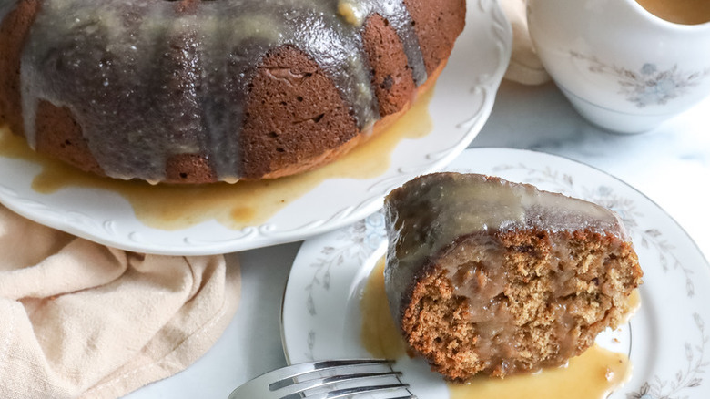 Sticky toffee bundt cake served onto plate