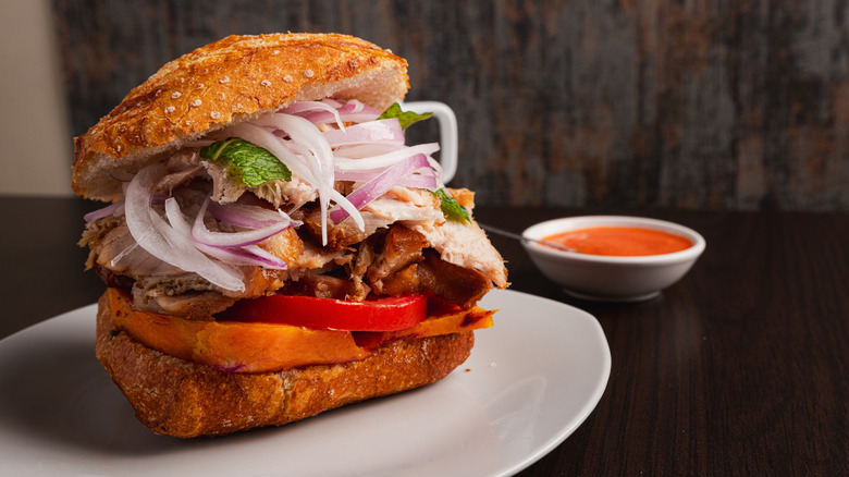 Pan con chicharrón sandwich with pork and onions