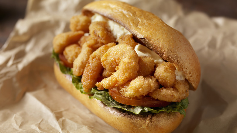 Shrimp po'boy on brown paper