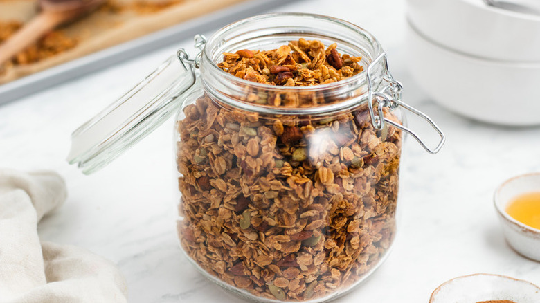 Granola in open glass jar