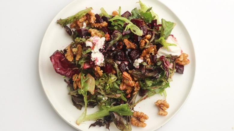 Roasted beet salad on white plate