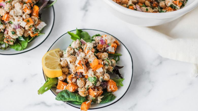 Sweet potato and chickpea salad served into bowls