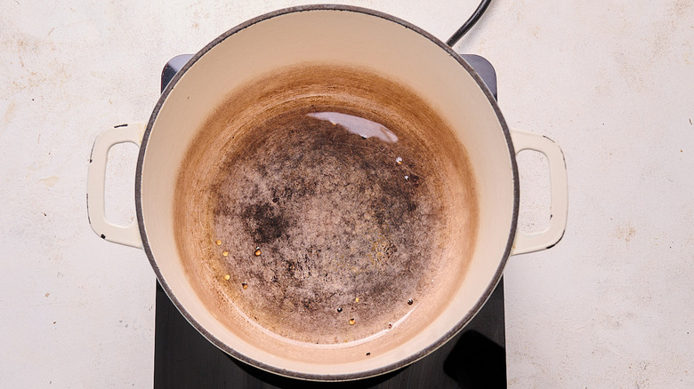 heating oil in a pot