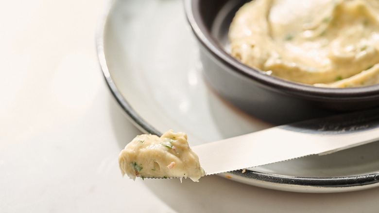 anchovy butter on a knife