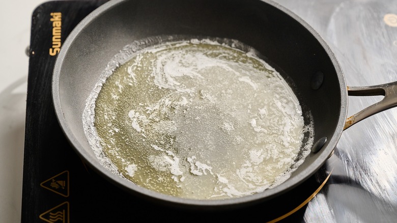 melting butter in a skillet