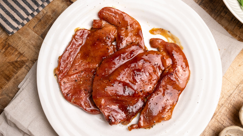 Glazed ham steaks on plate