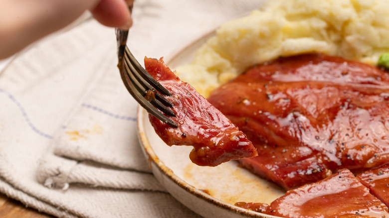 Forkful of glazed ham