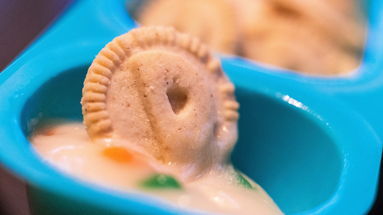 Cookie dipped in funfetti frosting