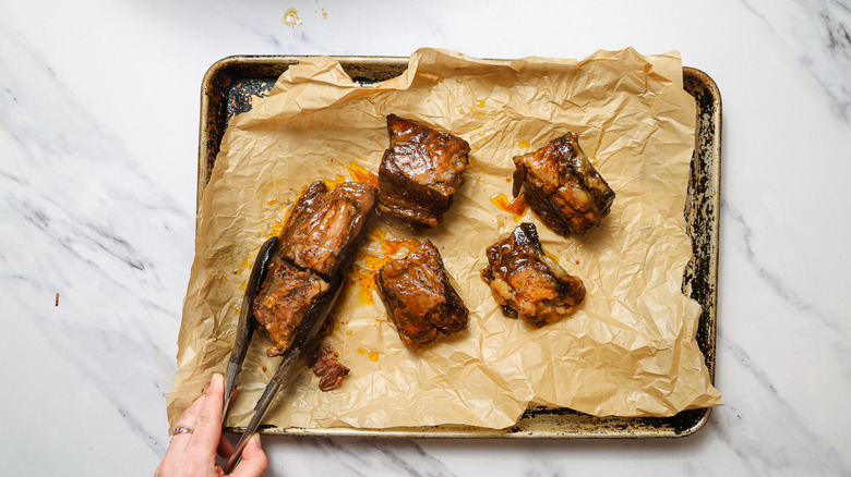 Short ribs on baking sheet