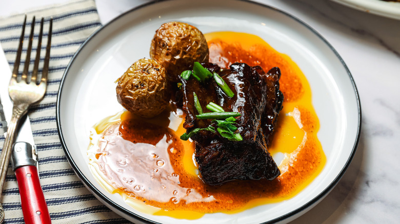 Plate with potatoes and short rib