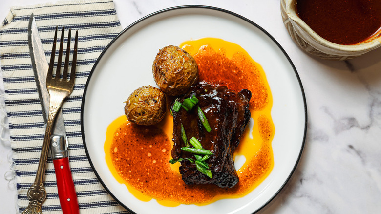 Plate with potatoes and short rib