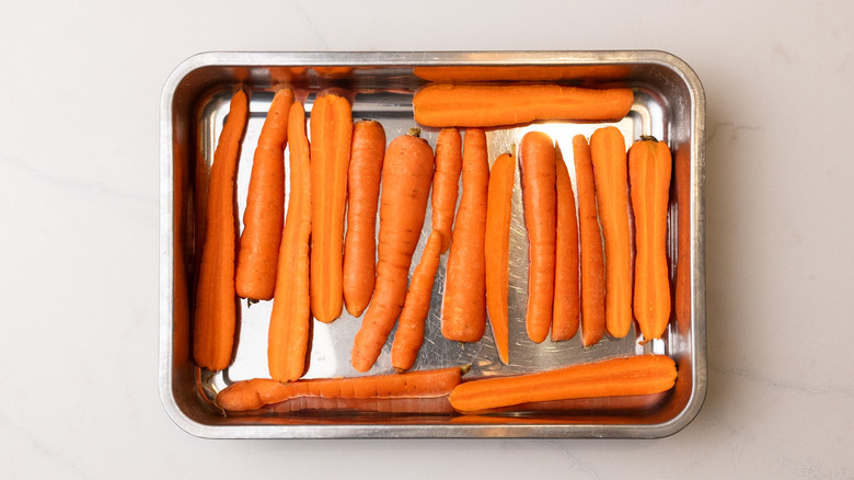 sliced carrots in baking tray