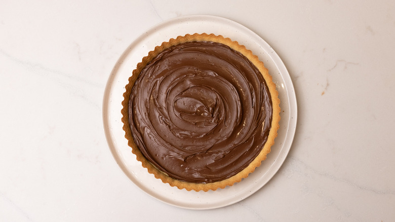 Nutella spread on pie crust