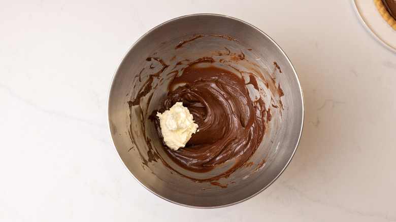 adding whipped cream to Nutella
