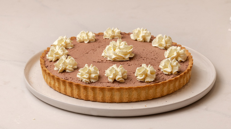 whipped cream on Nutella pie