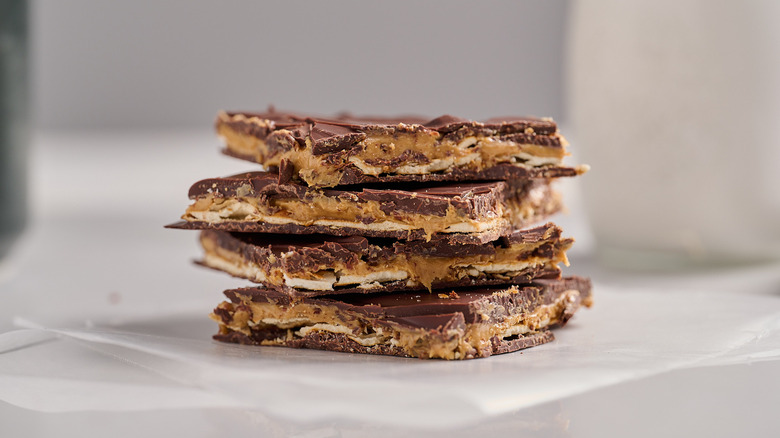 peanut butter pretzel bark stacked on a table