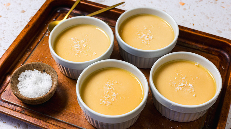 4 ramekins of salted caramel panna cotta