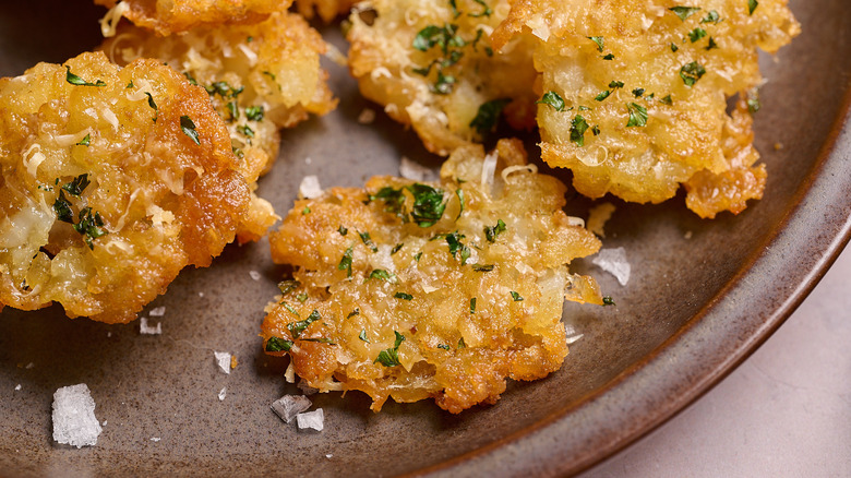 smashed tater tot on a plate