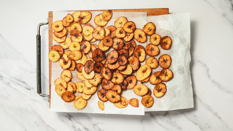 Plantain chips on paper towel