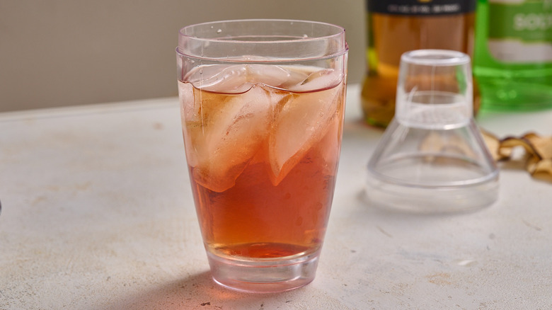 cocktail shaker filled with cocktail ingredients