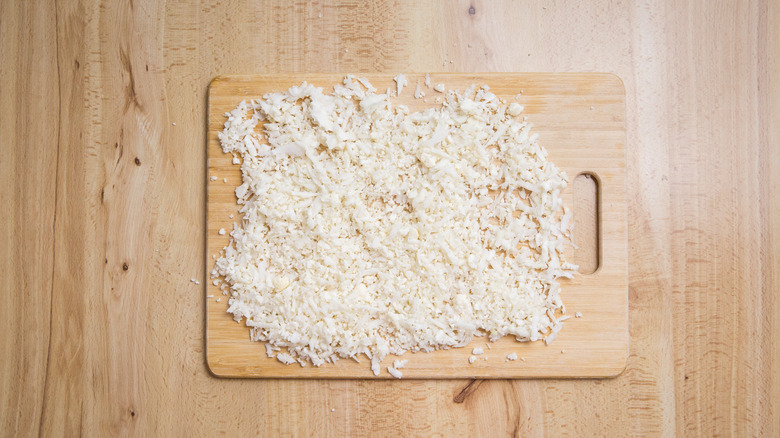 grated cauliflower on board