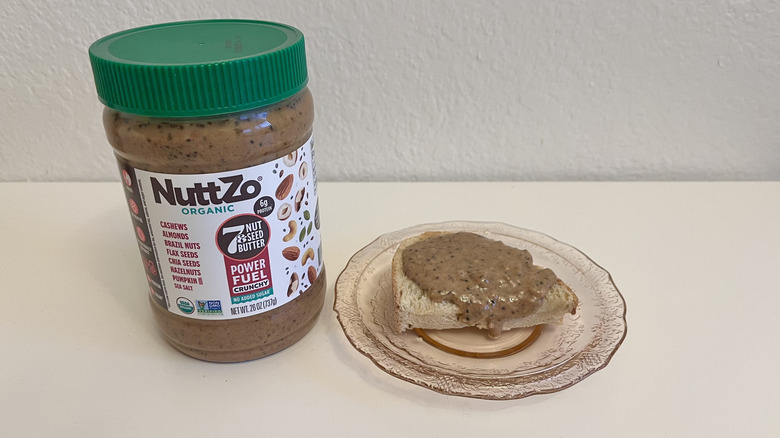 Jar of NuttZo Organic 7 Nut & Seed Butter with bread