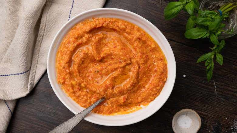 Bowl of romesco sauce with spoon
