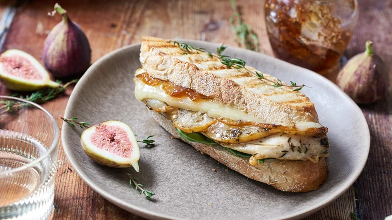 Chicken and Pear Panini on gray plate with fig