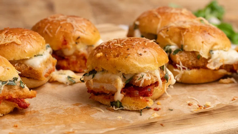 Chicken Parmesan Sliders on parchment paper