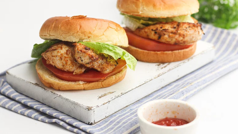 Grilled Cajun Chicken Sandwiches on white board