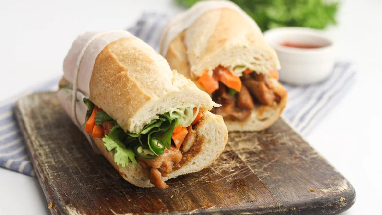 Simple Banh Mi Sandwich on wooden cutting board