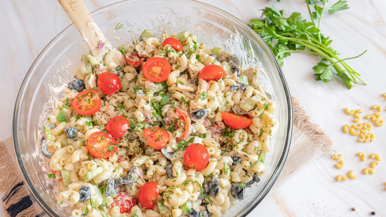 Chicken macaroni salad in a large glass bowl