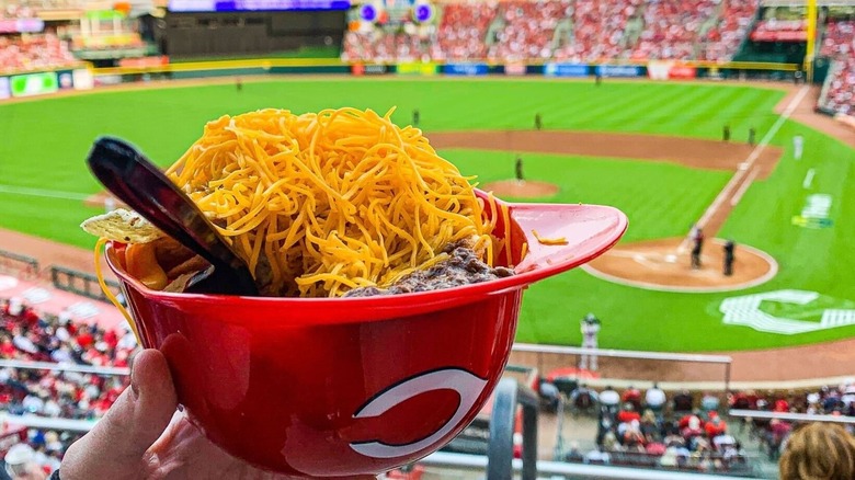Skyline chili in helmet bowl with field blurred in background