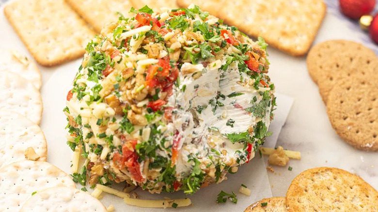 ball of cheese coated in nuts and herbs