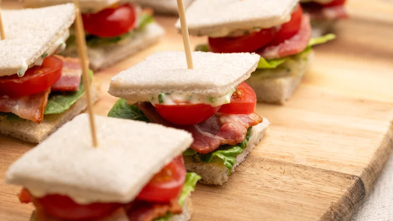 mini blt sandwiches on cutting board