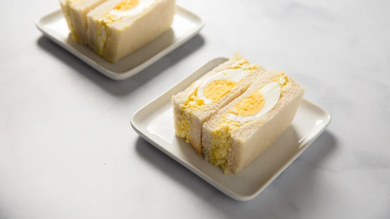 Japanese Egg Sandwich (Tamago Sando) on white square plate